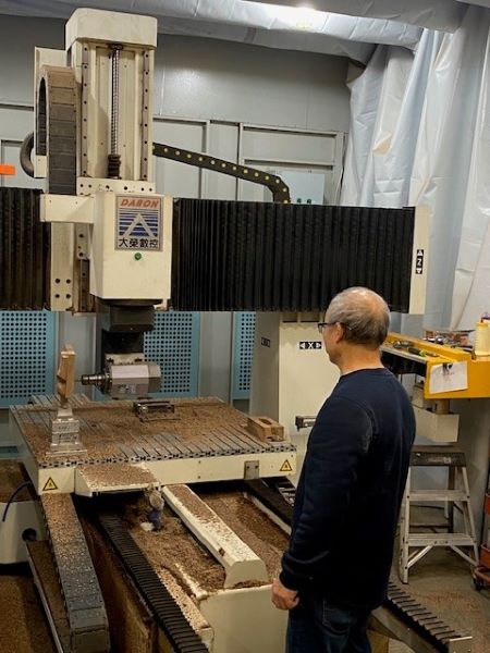 At Grip Plus, Sai Chiang Will Make You the Most Accurate Shotgun Grip on the Planet 6 A CNC machine in the Grip Plus shop creating a bespoke stock.