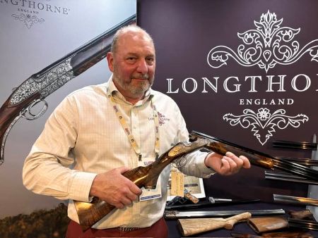 Longthorne’s Managing Director, James Longthorne Stewart at the 2026 Dallas Safari Club Convention with a Foxcoate.